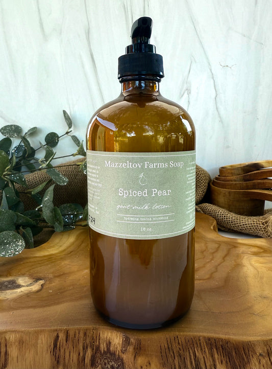 Spiced Pear goat milk lotion in 16oz amber glass pump bottle