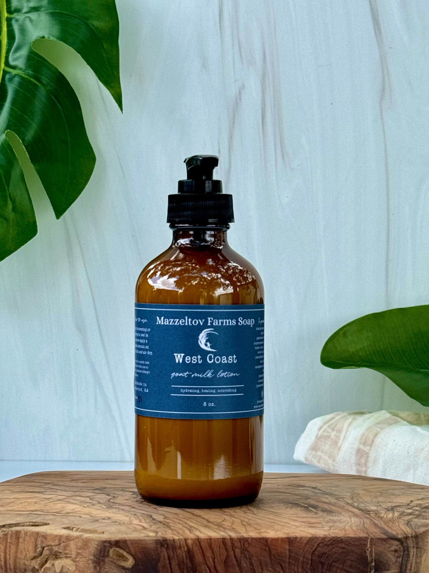 West Coast goat milk lotion in 8 oz amber glass pump bottle, oceanic scented natural body lotion