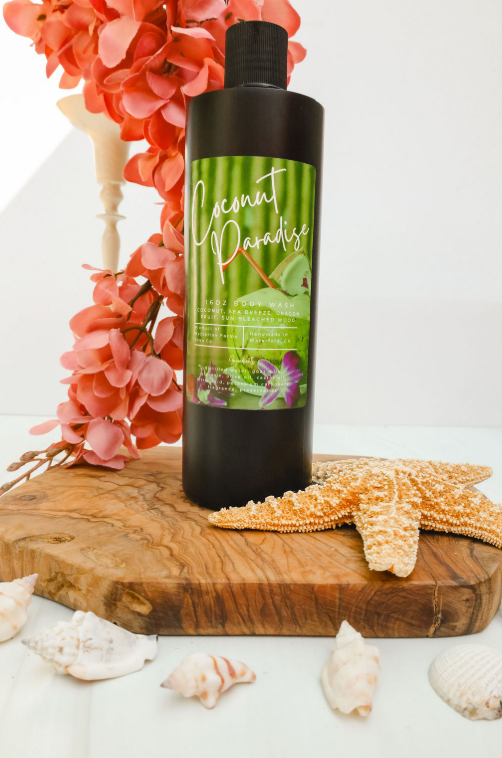 Coconut Paradise goat milk body wash in black squeeze bottle, coconut scented natural body wash with beachy fragrance