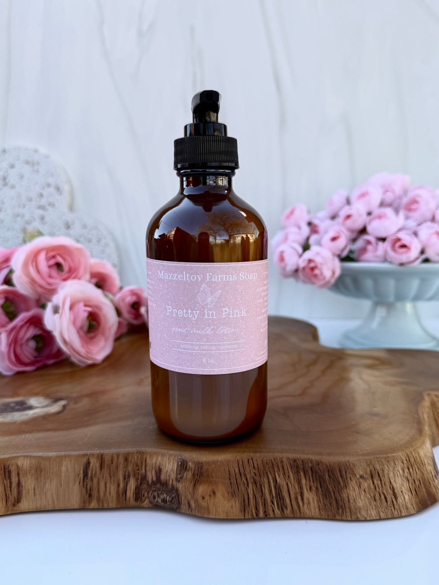 Pretty in Pink goat milk lotion in an 8 oz bottle by Mazzeltov Farms Soap Co. Soft floral scent with magnolia, pink jasmine, and warm amber.