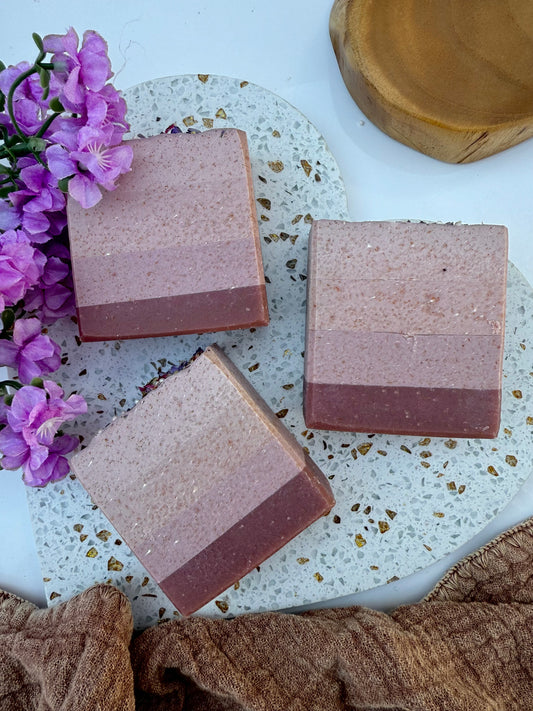 Saffron + Lace goat milk bar soap by Mazzeltov Farms Soap Co. Elegant handmade bar with flower petals and white bursting beads, featuring warm amber, jasmine, and saffron notes.