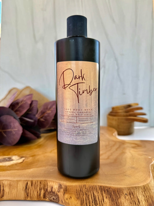 Dark Timber goat milk body wash in 8oz amber glass pump bottle