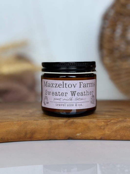 Sweater Weather goat milk lotion in 2oz amber jar