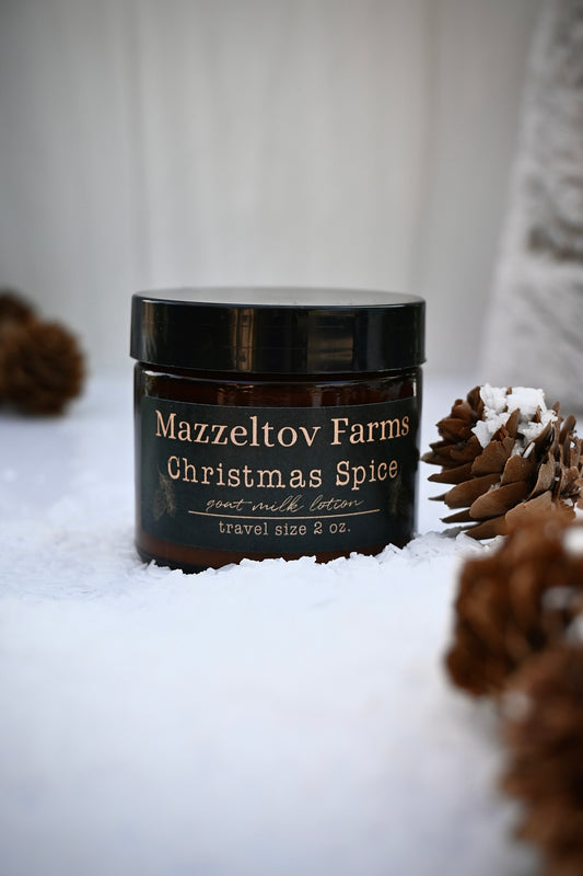 Christmas Spice Goat Milk Lotion in amber glass pump – spicy holiday scent with cinnamon and clove