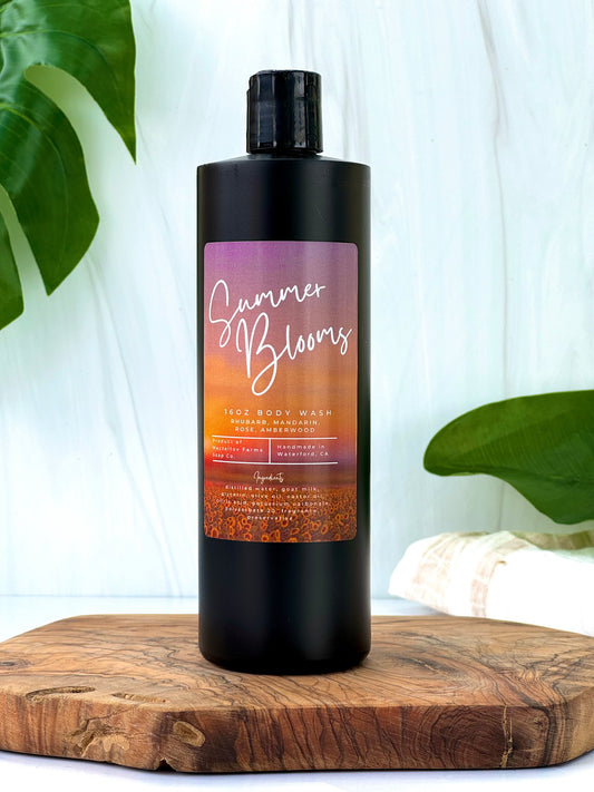 Summer Blooms goat milk body wash in black squeeze bottle, fruity floral scented natural body wash